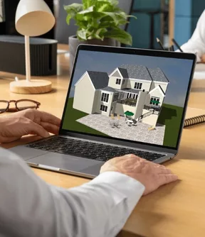 3D home design displayed on a laptop